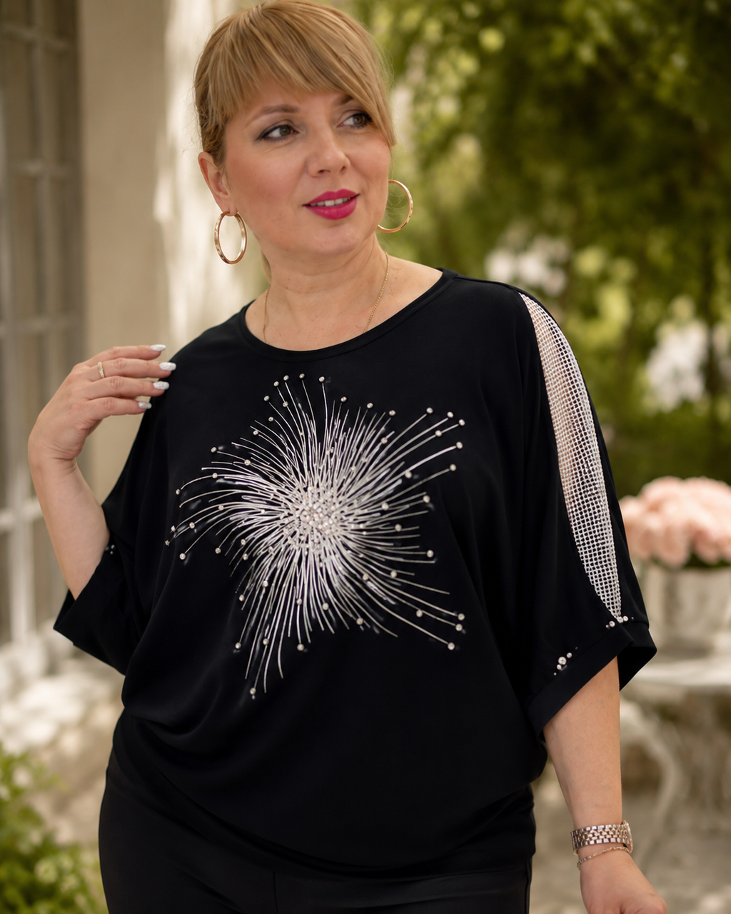 Blusa elegante con diseño brillante
